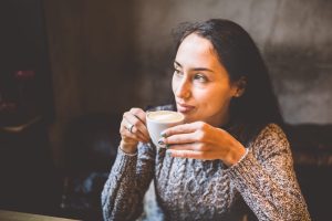 Woman drinking coffee — is coffee good for you?
